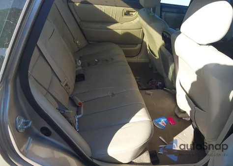 2002 Toyota Avalon Xl z USA, uszkodzony, nr VIN 4T1BF28B32U243642